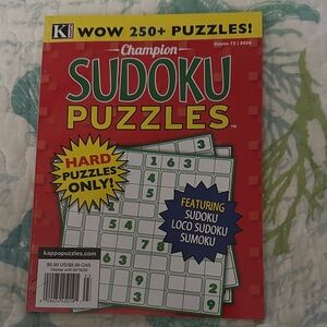 Champion Sudoku Puzzles - Red and Yellow Cover